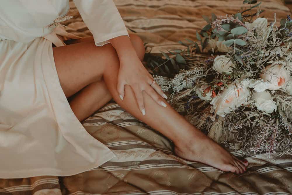 Luxurious wedding decor with elegant floral arrangements and high-end venue setting.