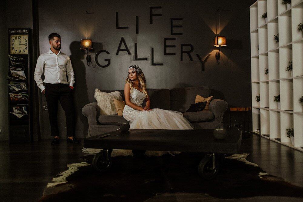 Luxurious wedding photo shoot in a sophisticated indoor setting with elegant decor and high-end styling.