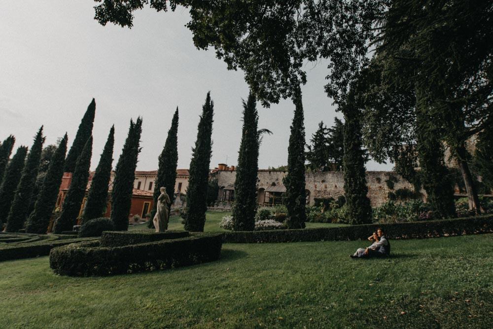 Luxurious wedding venue with elegant cypress trees and scenic outdoor landscape.